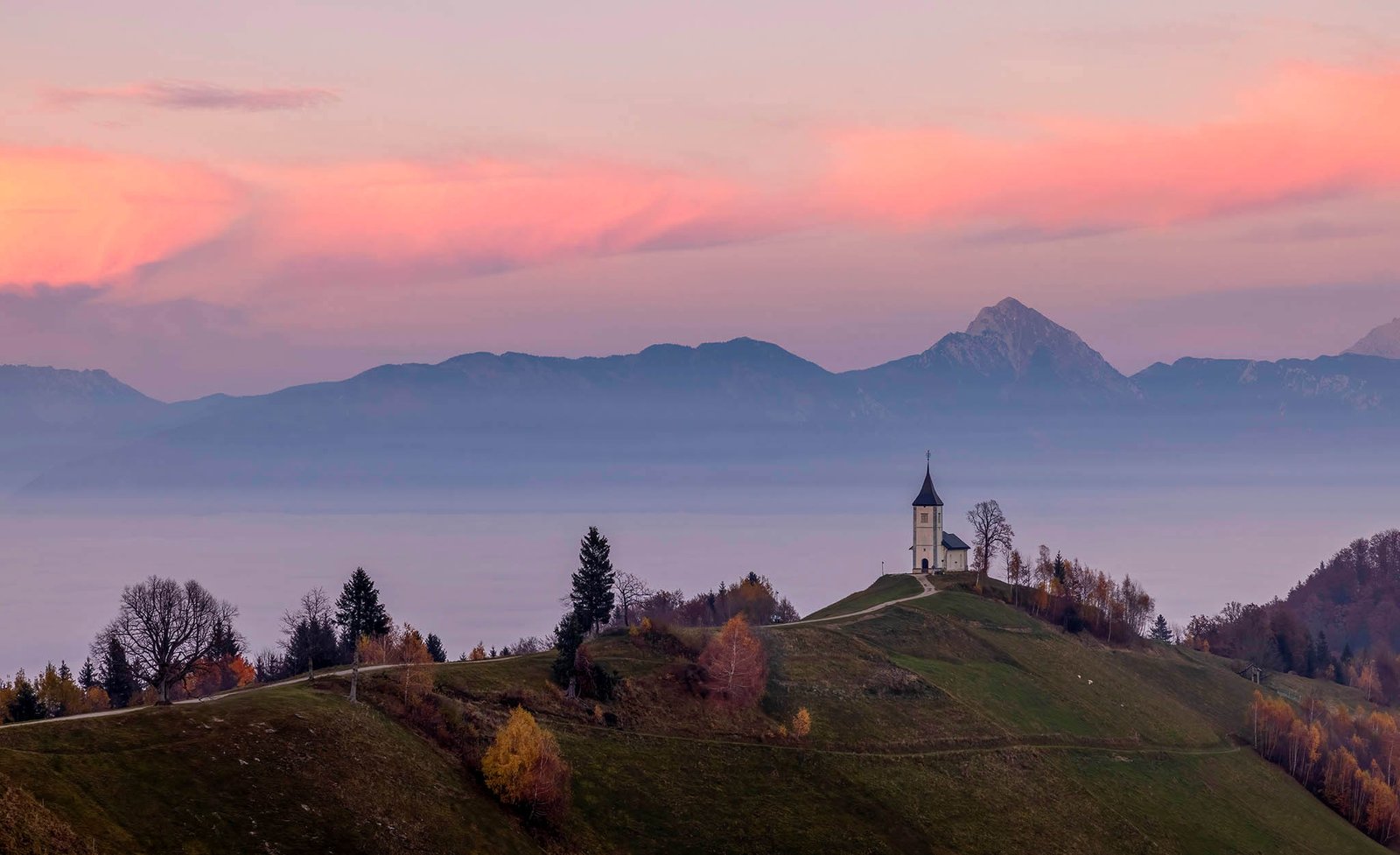 Jamnik Church and the Kamnik Alps at sunrise, Slovenia.