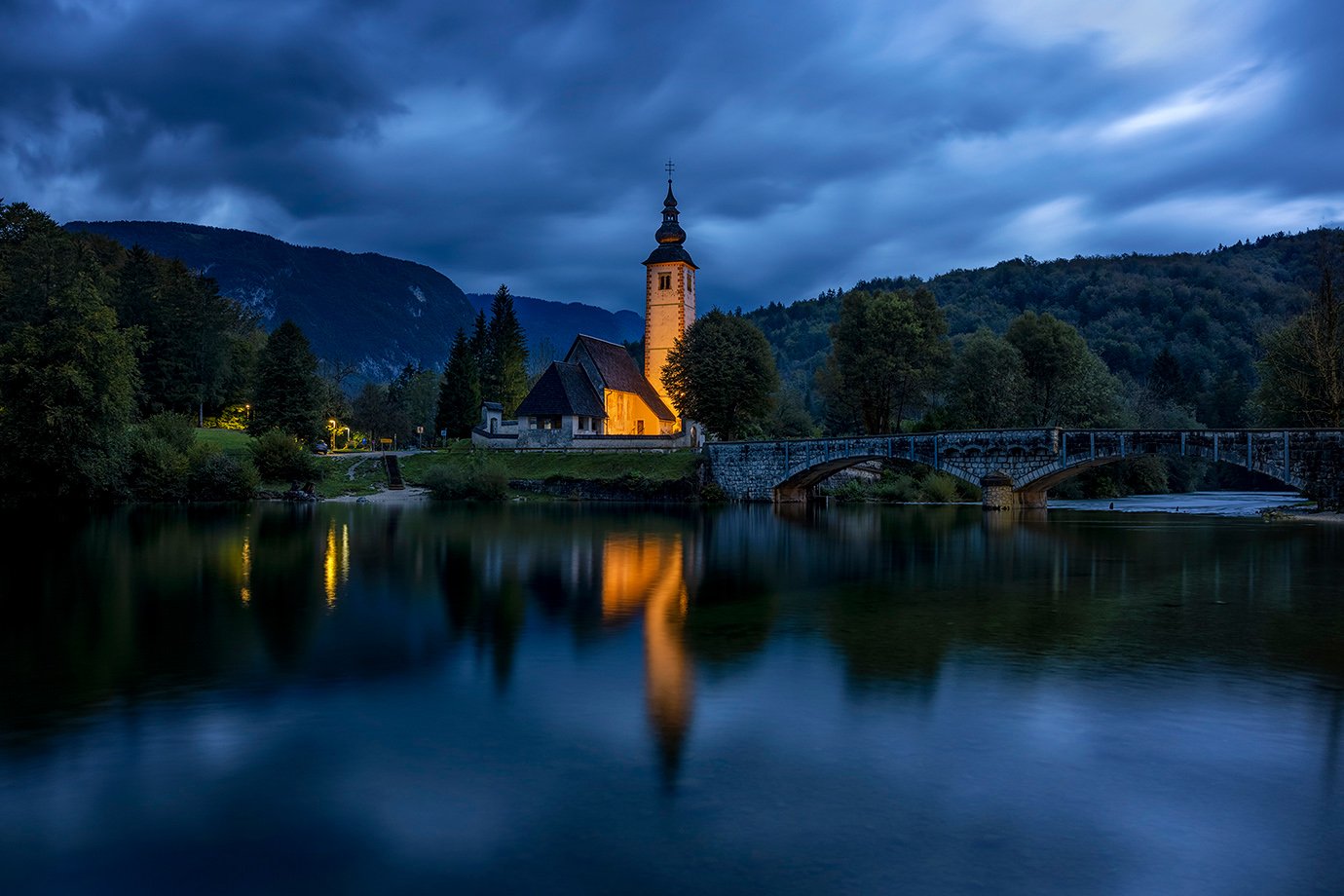 Church of Saint John at Lake Bohinj during the blue hour, Slovenia. One of many beautiful churches in Slovenia to photograph.